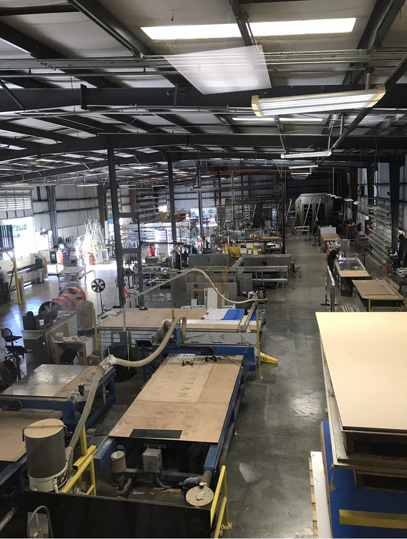 AIS Boynton Beach, Florida manufacturing shop floor with fabrication equipment and materials